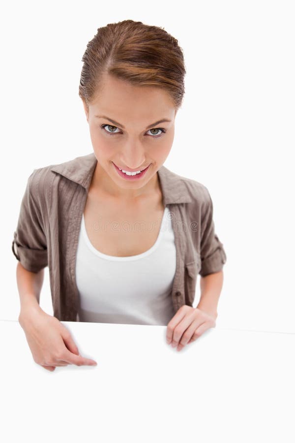 Smiling Woman Pointing Down at Blank Signboard Stock Photo - Image of displaying, adorable: 22664222 Smiling Woman Pointing Down at Blank Signboard Stock Photo - Image of displaying, adorable: 22664222