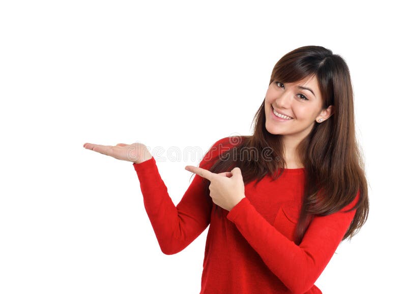 Smiling woman pointing product royalty free stock images