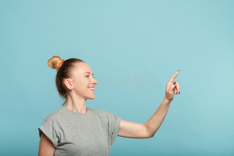 Smiling woman push button virtual interface stock image Smiling woman push button virtual interface stock image