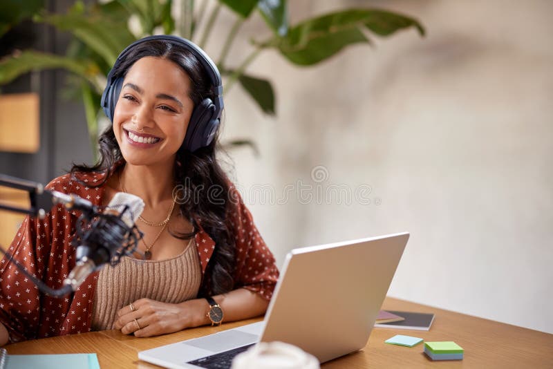 Smiling woman recording podcast