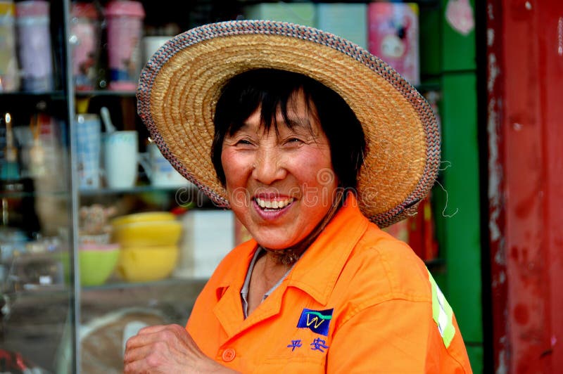 Pixian Old Town, China: Woman Wearing Straw Hat