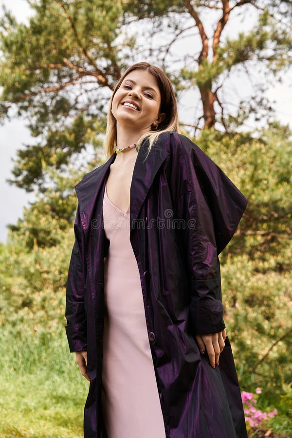 Smiling woman in spring sunlight dressed stock photography