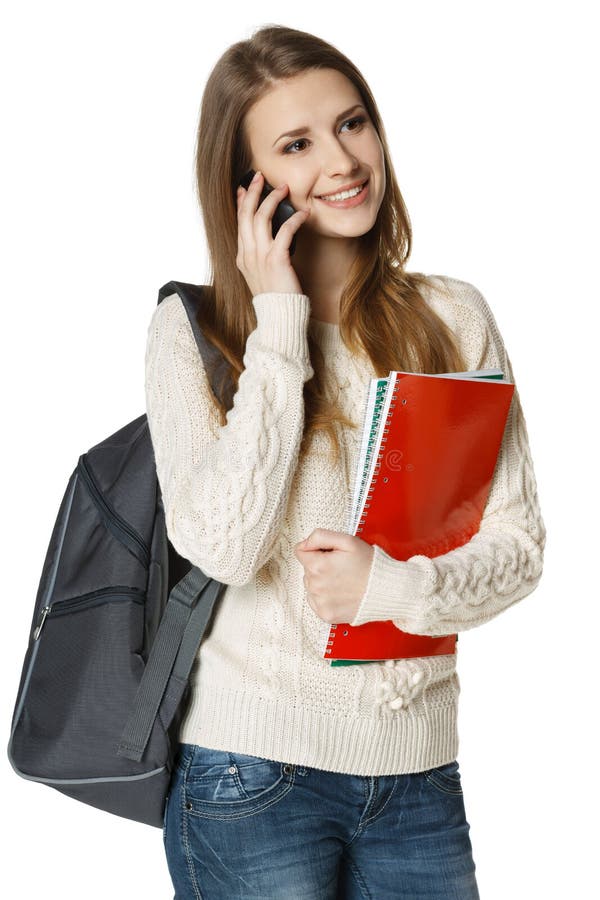 Smiling woman student talking on cell phone stock photography Smiling woman student talking on cell phone stock photography