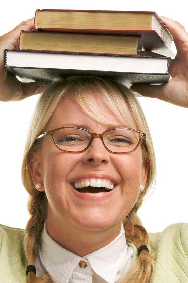 Smiling Woman Under Stack of Books on Head