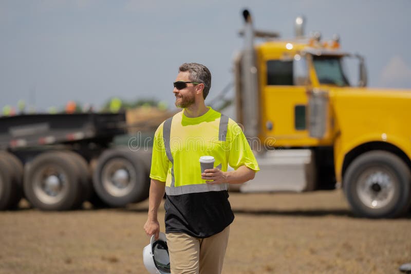 Smiling Worker at Coffee Break. Male Contractor at Working Location
