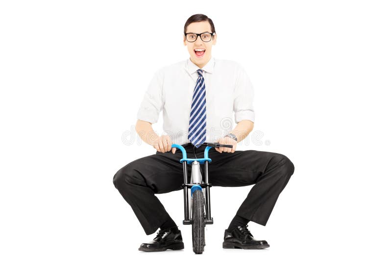 Smiling Young Businessman Riding a Small Bicycle Stock Image Image of