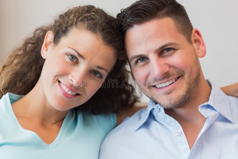 Smiling young couple at home stock photo Smiling young couple at home stock photo