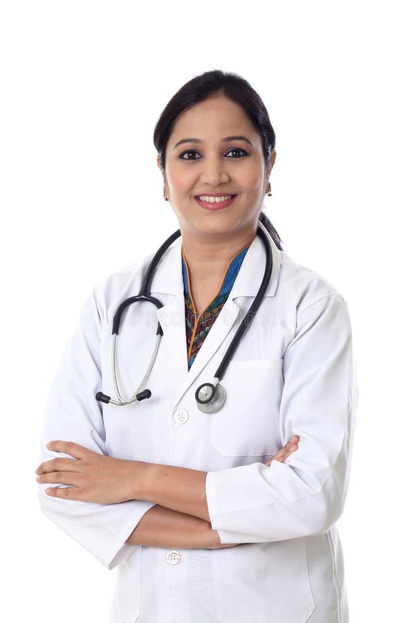 Smiling Doctor Woman With Arms Crossed Against White Background Stock