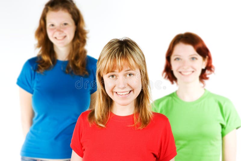 Three girls with cups stock image. Image of indoors, everyday