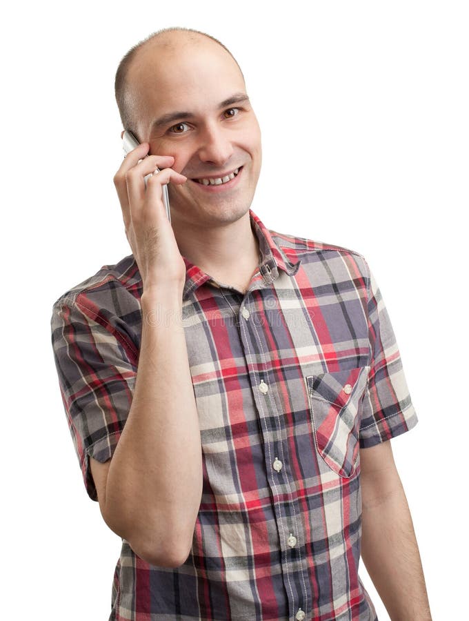 Smiling young man talking on cell phone