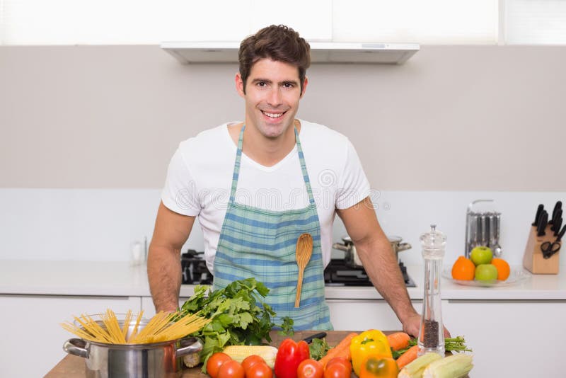 Funny Cooking. Attractive Caucasian Man In The Kitchen Stock Photo, Picture  and Royalty Free Image. Image 65857067.