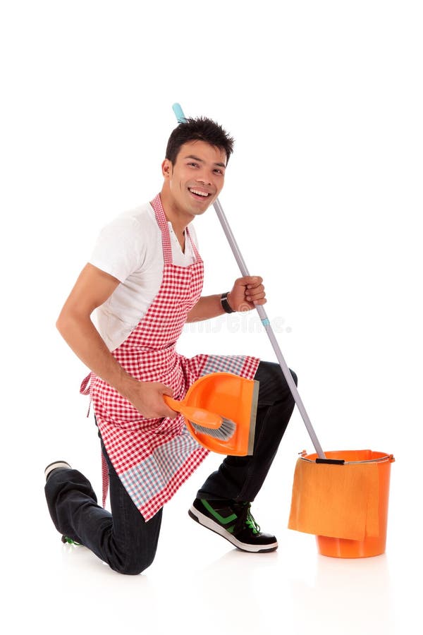 Smiling young Nepalese man, housework stock image Smiling young Nepalese man, housework stock image