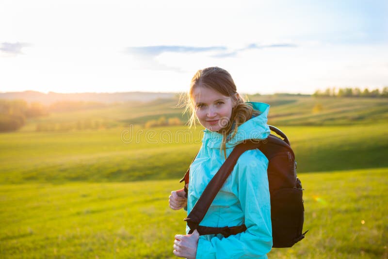 Smiling Young Woman with Backpack Hiking Stock Photo - Image of hiking ...