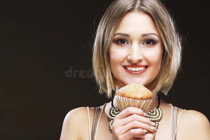 Smiling Young Woman with a Cake Stock Photo Image of female, cheerful