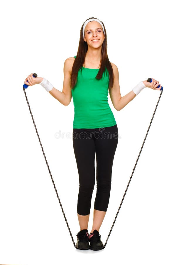 Smiling young woman with jump rope