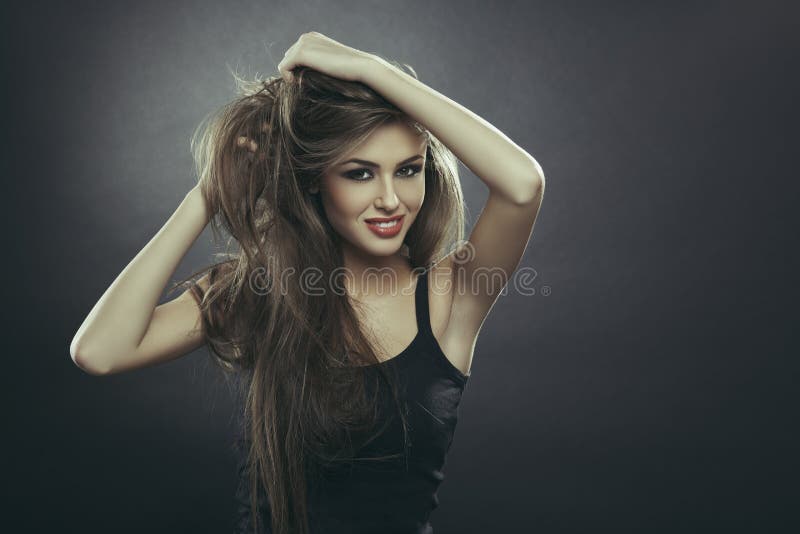Gorgeous Woman Playing with Hair Stock Photo - Image of hands, gorgeous ...