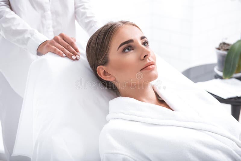 Smiling Young Woman Lying On Daybed At Beauty Salon Stock Image Image