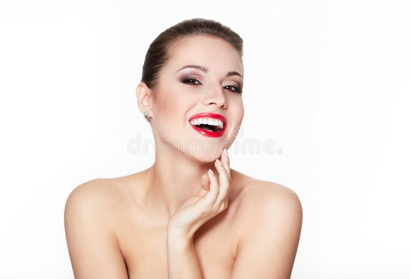 Smiling young woman model with glamour red lips