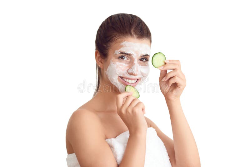 Smiling young woman wearing a face mask