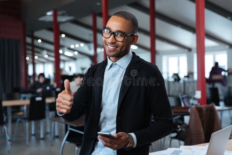 Smilling businessman show okay sign