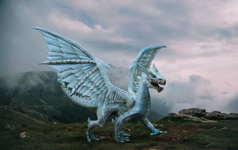 Fantasy dragon stands on the top of the mountain. A huge dangerous animal with large, sharp wings. Beautiful alpine nature background, dramatic gray blue sky with white clouds. Fantasy dragon stands on the top of the mountain. A huge dangerous animal with large, sharp wings. Beautiful alpine nature background, dramatic gray blue sky with white clouds.