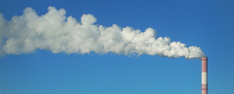 Smoke from the chimney. One pipe of factory and clear blue sky