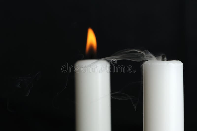 Burning and Blown Out Candle with Smoke