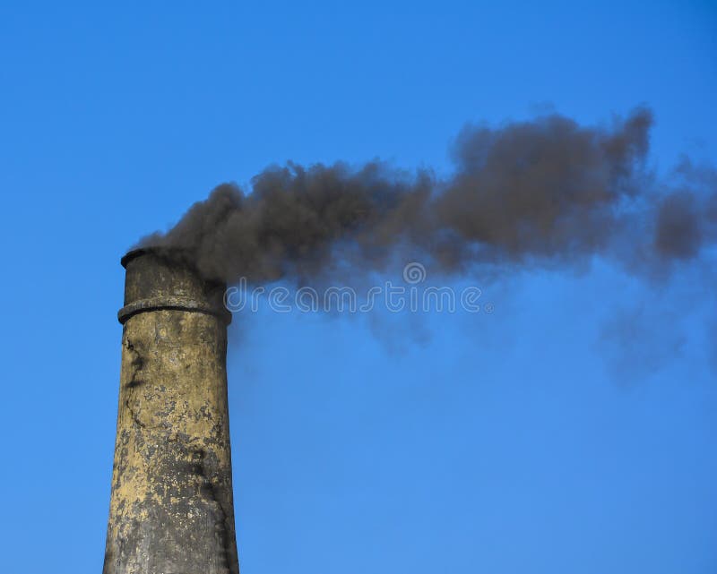 Smoke coming from chimney of a brick kiln