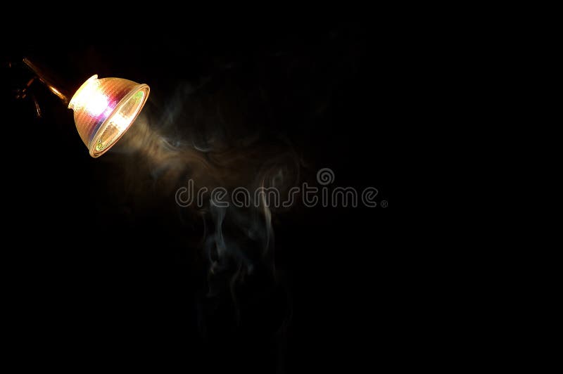 Smoke in the light of a bulb