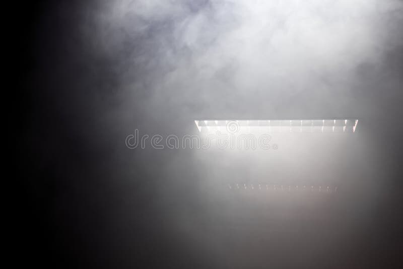 The smoke with neon tube light fluorescent in a dark room.