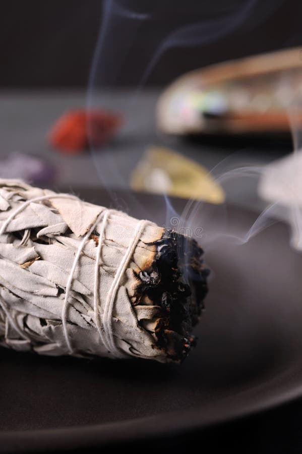 The smoke of white sage bundle