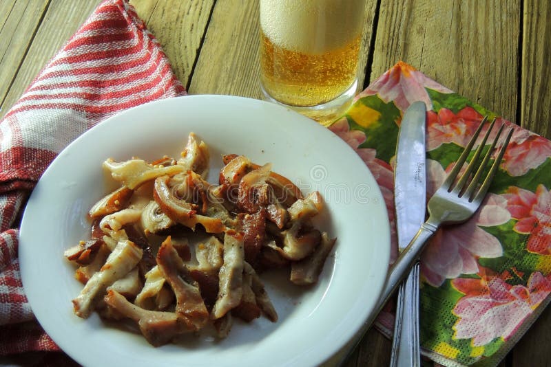 Smoked pig ears. Beer stock image. Image of food, lemon 92135389