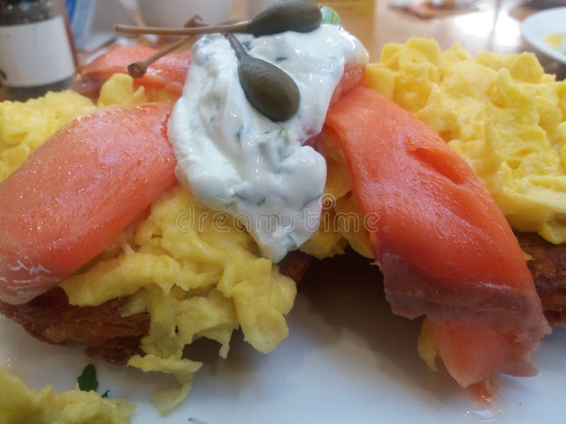Smoked Salmon with Scrambled Eggs Capers and Cream Cheese Stock Photo
