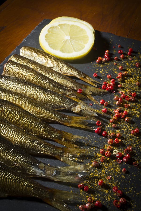 Smoked small fish stock image. Image of fish, lemon 181848677