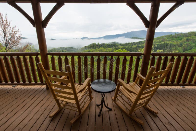 Foggy view from a cabin on a cloudy early morning in the Great Smokey Mountains, Tennessee. Foggy view from a cabin on a cloudy early morning in the Great Smokey Mountains, Tennessee.