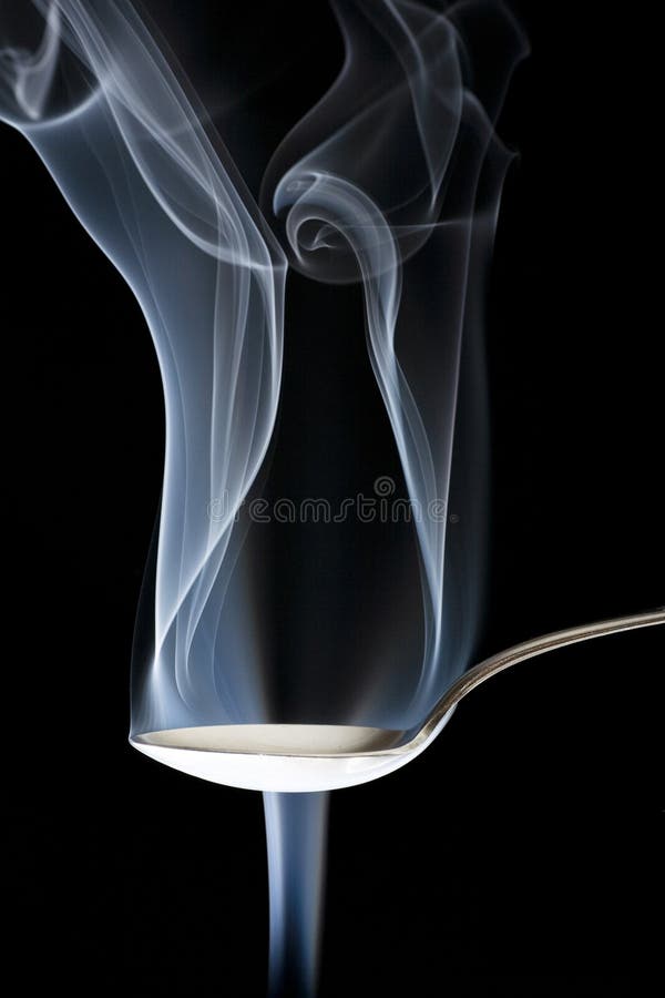 Conceptual abstraction of smoke bending around a silver spoon. Conceptual abstraction of smoke bending around a silver spoon.