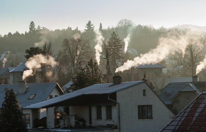 Smoking chimney smoke pollution, small house town