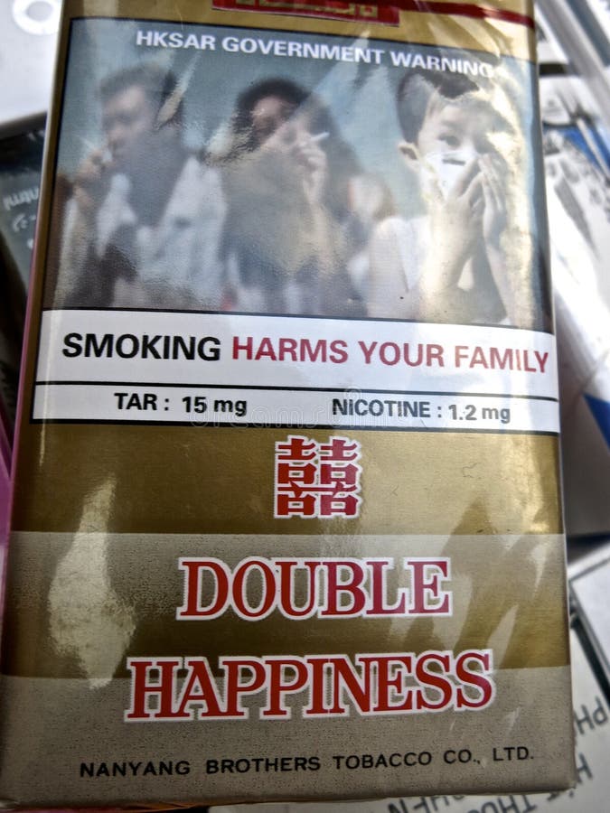 Smoking Packaging and Warning Label an Ironic Cigarette Package Displays the Brand Name