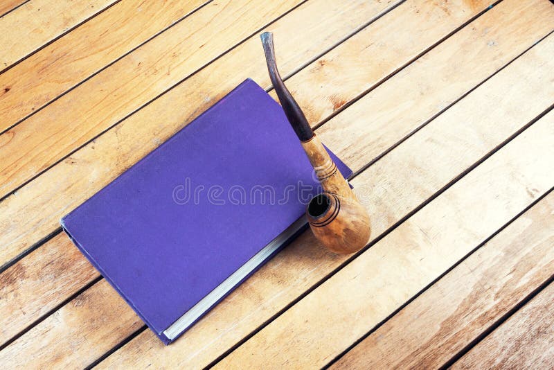 Smoking pipe and book stock image. Image of intellectual 47056765