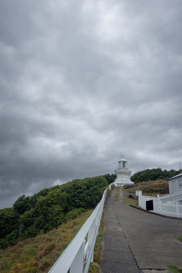 A threatening overcast sky over a lighthouse. Smoky Cape Lighthouse in Hat Head National Park on the East coast of Australia in the state of New South Wales