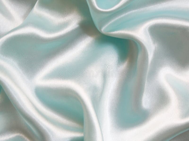 Smooth elegant blue silk as background royalty free stock photos