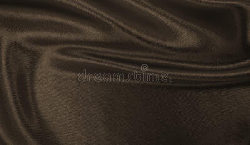 Smooth elegant brown silk or satin texture can use as abstract background. Luxurious background design. In Sepia toned. Retro style