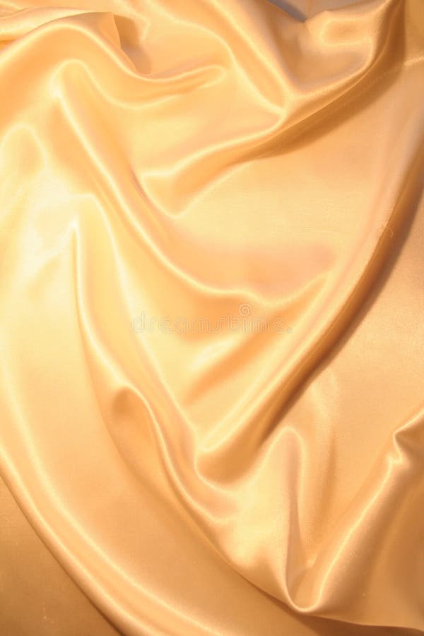 Smooth elegant gold satin background stock photography