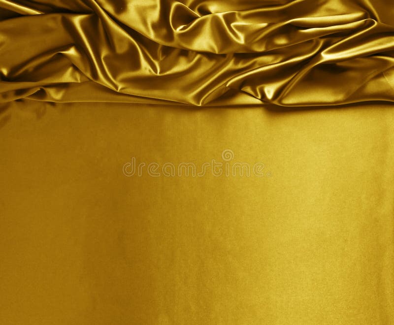 Smooth elegant gold silk or satin texture stock images