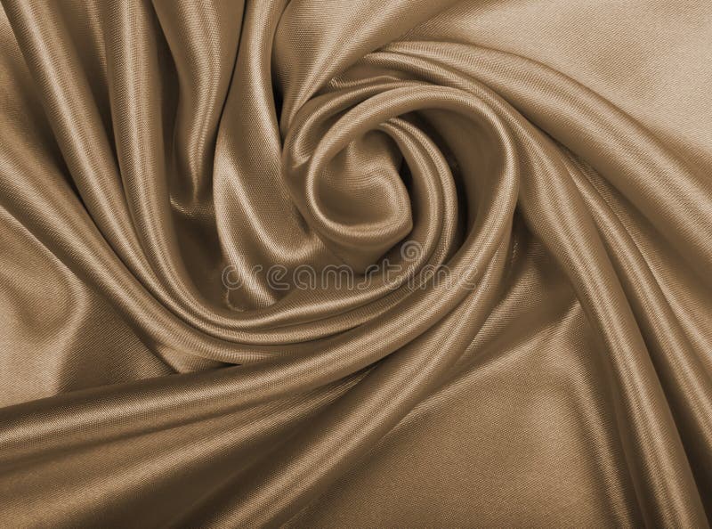 Smooth elegant golden silk or satin as wedding background. In Se