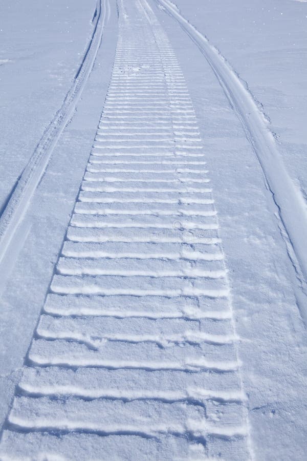 Smooth Snow with Snowmobile Trail Stock Photo Image of light