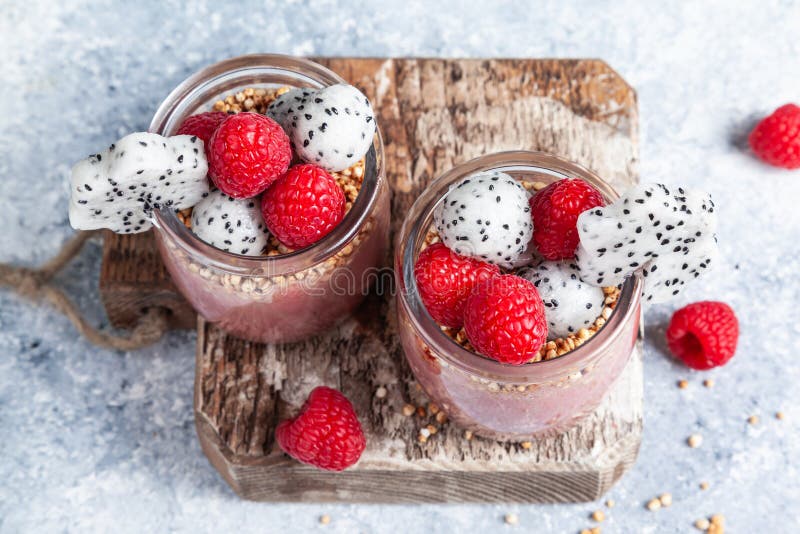 Smoothie with raspberries, banana, pitahaya, quinoa and almond milk