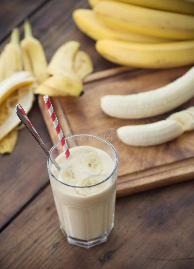 Banana Smoothie on wooden table. Banana Smoothie on wooden table