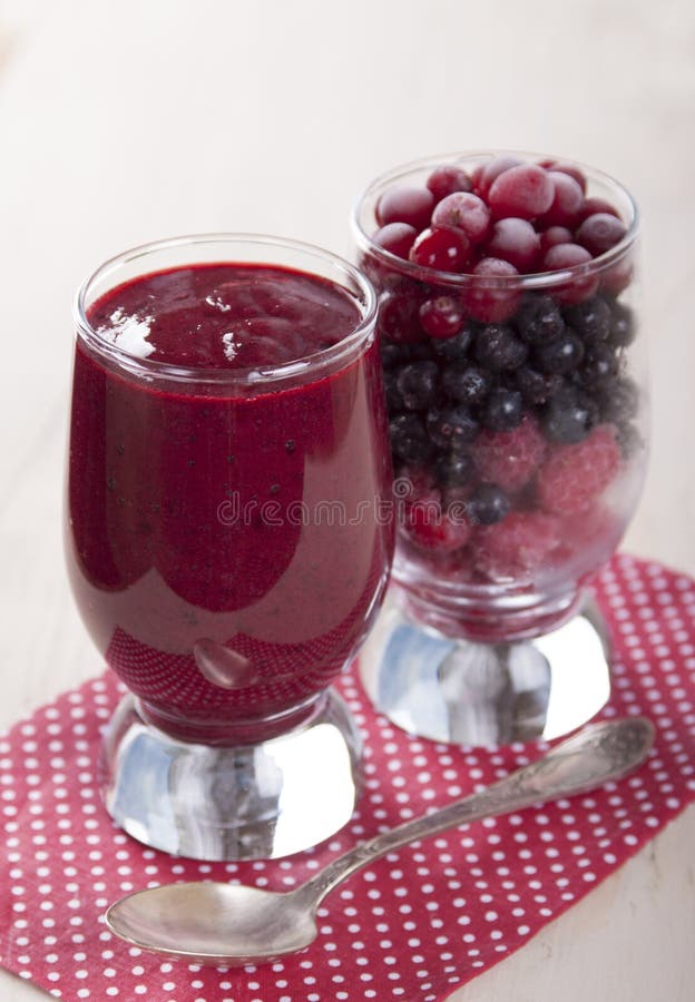 Smoothies of Frozen Raspberries, Blueberries and Cranberry with Stock