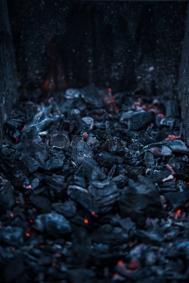 Smouldering coals at barbeque campfire royalty free stock photo Smouldering coals at barbeque campfire royalty free stock photo